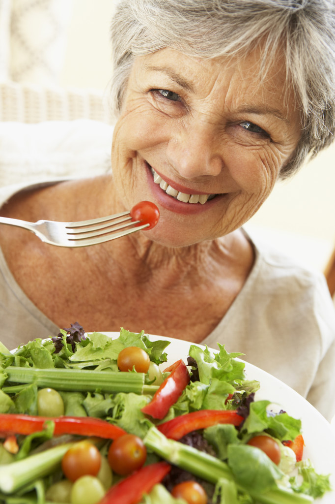 Senior Woman Eating Healthy Salad