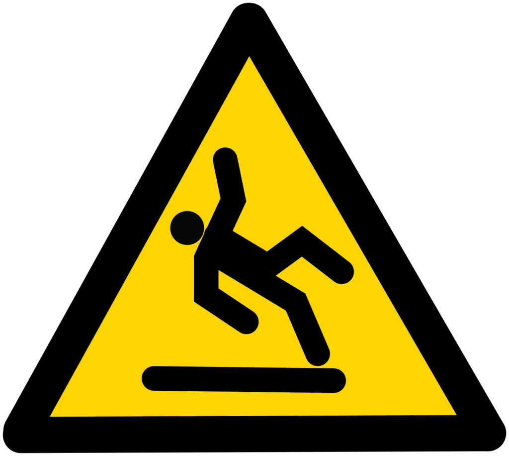 Yellow and black warning signage: Slippery 