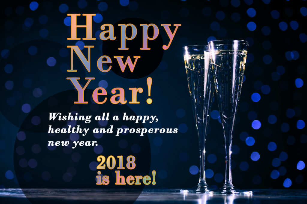 Two champagne glass on dark indigo background with colorful lettering Happy New Year!