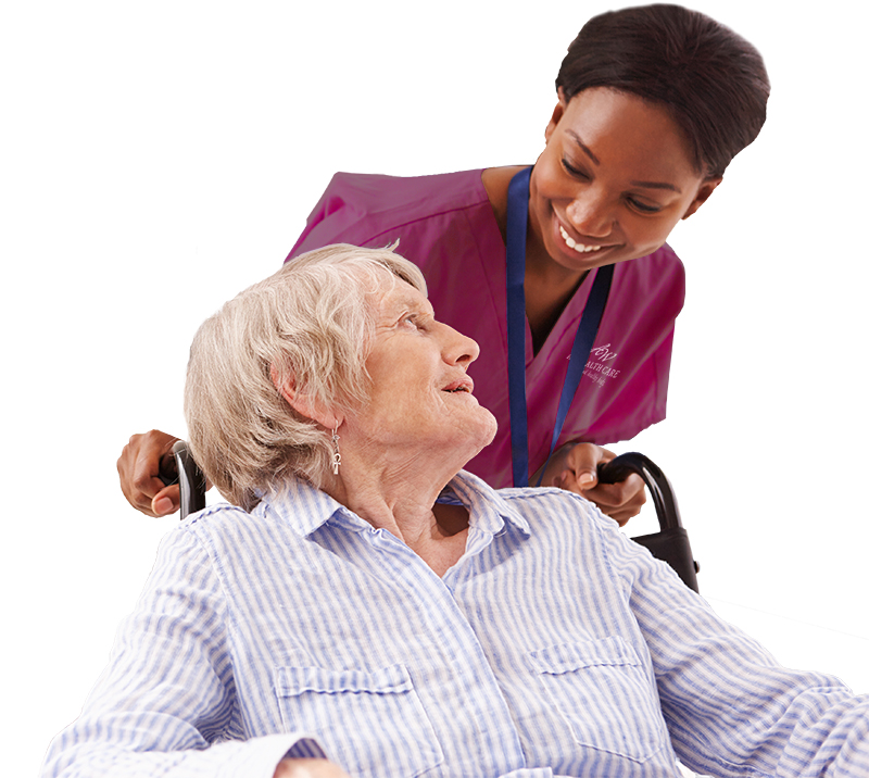 Nurse smiling with patient in wheelchair.