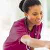 Nurse smiling and comforting patient